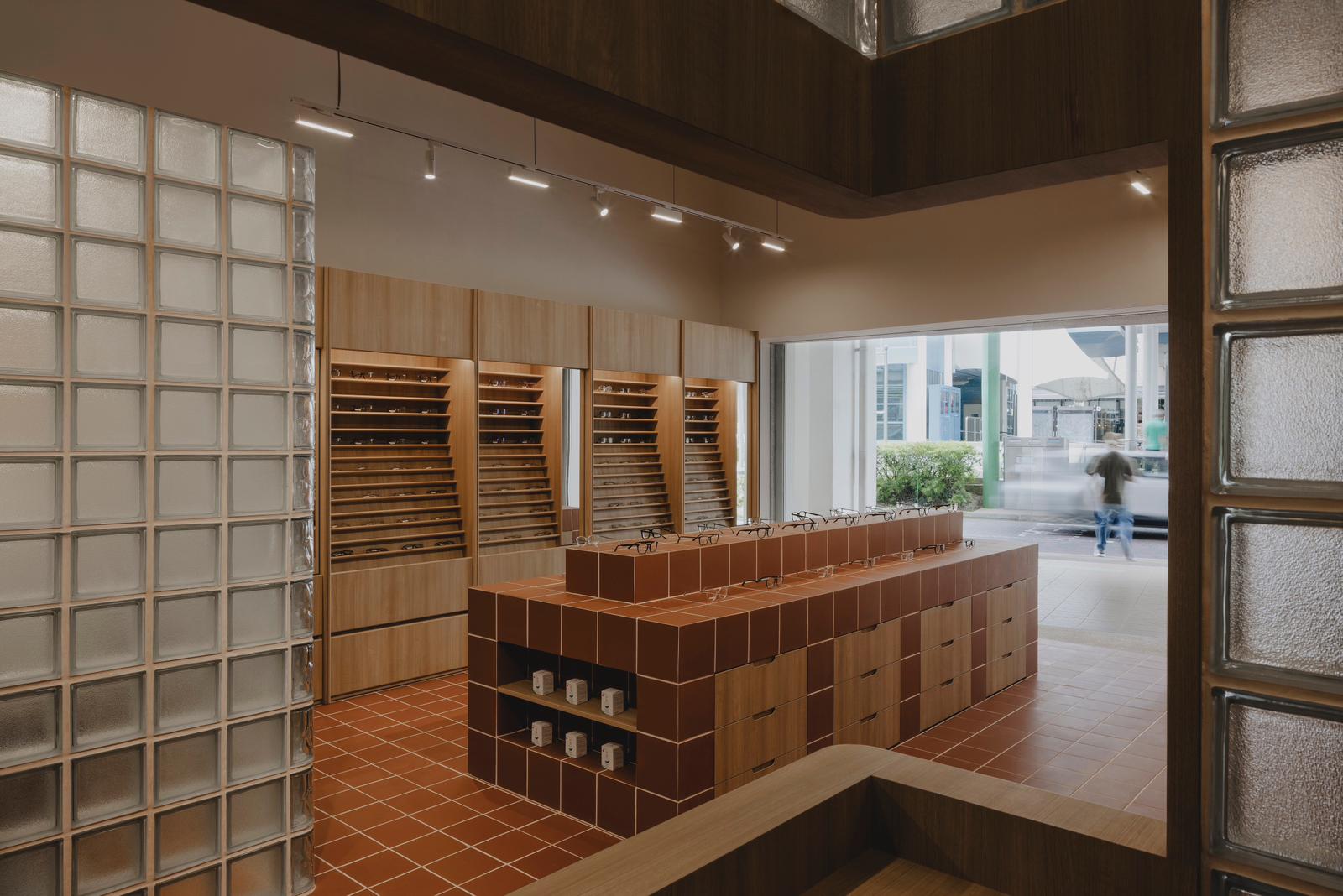 Eyecandy Optical showroom with walls of eyewear frames